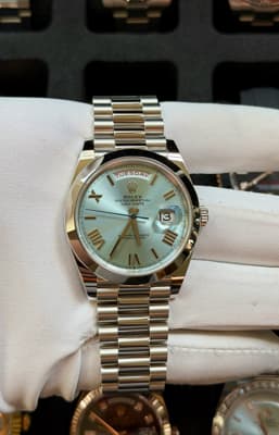Rolex Day-Date 40 Ice Blue Roman Dial Smooth Bezel